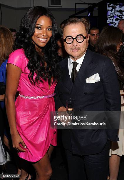 Gabrielle Union and Michael Chow attend the Dior pop-up shop featuring Anselm Reyle for Dior at Miami Design District on November 29, 2011 in Miami...