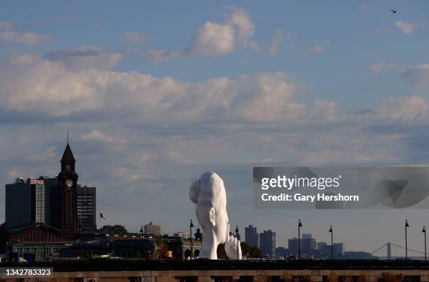 Sculpture named "Water's Soul" by Spanish artist Jaume Plensa sits in a park under construction along the Hudson River across from New York City on...