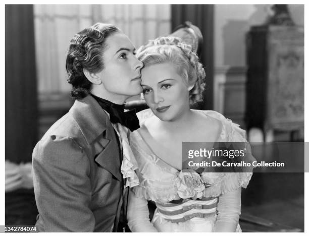 Actor Tyrone Power in his first leading role as 'Jonathan Blake' and British Actress Madeleine Carroll as 'Lady Elizabeth' in a scene from the movie...