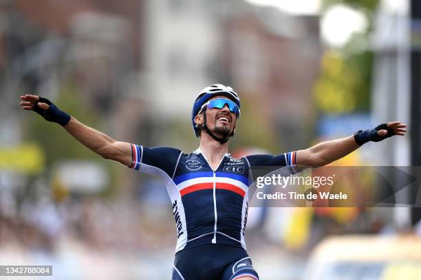 Julian Alaphilippe of France celebrates at finish line as race winner during the 94th UCI Road World Championships 2021 - Men Elite Road Race a...