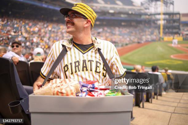 Vendor throws popcorn o fans during the game between the San Diego Padres and the Pittsburgh Pirates at PNC Park on Thursday, June 29, 2023 in...