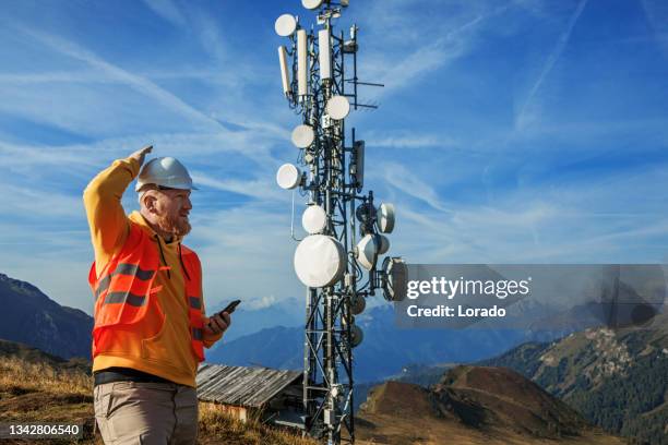 Telecom Building Engineer 330 Communication Tower Technician Stock Photos, High-Res Pictures, and ...