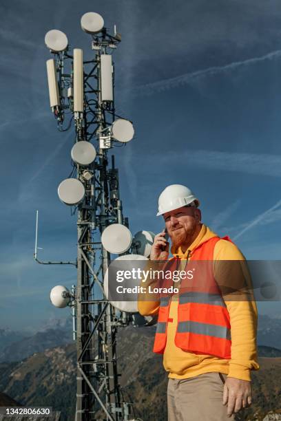 Telecom Building Engineer Communication Tower Technician Photos and Premium High Res Pictures ...