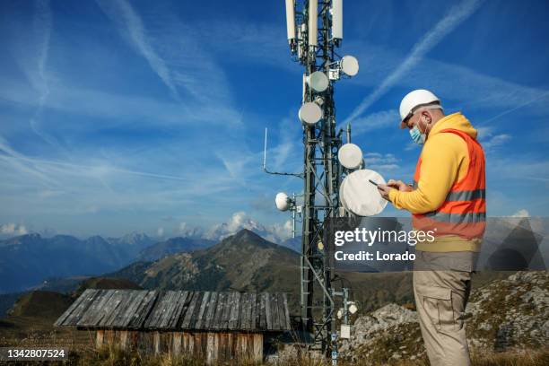 Telecom Building Engineer 330 Communication Tower Technician Stock Photos, High-Res Pictures, and ...