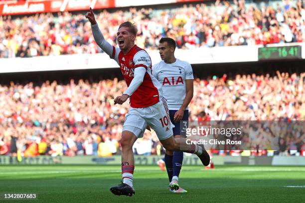 Emile Smith Rowe of Arsenal celebrates after scoring their side's first goal during the Premier League match between Arsenal and Tottenham Hotspur at...