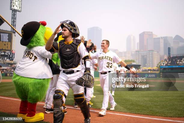The Pittsburgh Pirates celebrate after winning during the game between the San Diego Padres and the Pittsburgh Pirates at PNC Park on Thursday, June...
