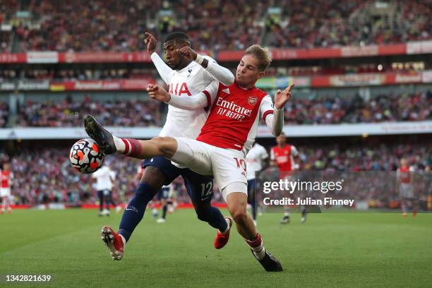 Emerson Royal of Tottenham Hotspur battles for possession with Emile Smith Rowe of Arsenal during the Premier League match between Arsenal and...