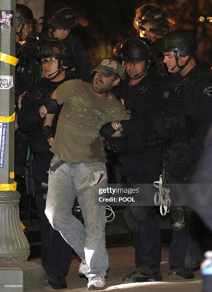 A protester is arrested as Los Angeles p