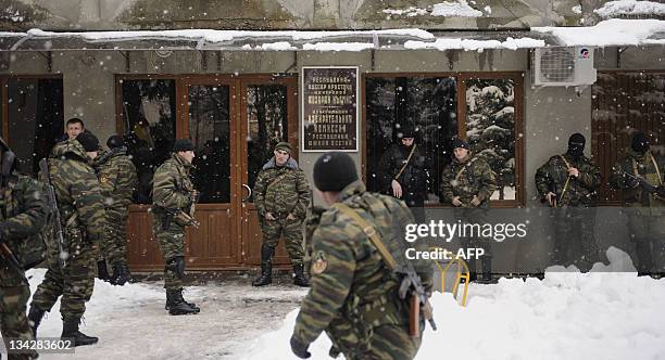 Security forces block on November 30, 2011 the entrance to South Ossetia's electoral commission office in Tskhinvali, the capital of Georgia's rebel...