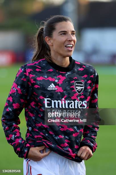 Tobin Heath of Arsenal smiles as she warms up prior to the Barclays FA Women's Super League match between Arsenal Women and Manchester City Women at...