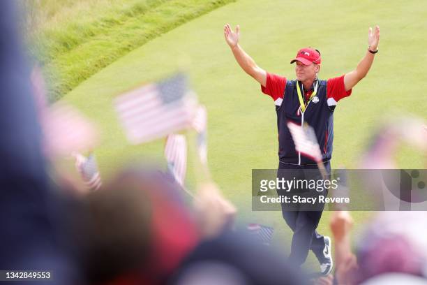 Captain Steve Stricker of team United States interacts with the crowd on the first tee during Sunday Singles Matches of the 43rd Ryder Cup at...