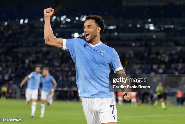 Felipe Anderson of SS Lazio celebrates after scoring their side's third goal during the Serie A match between SS Lazio and AS Roma at Stadio Olimpico...