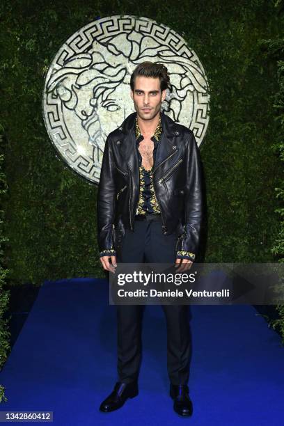 Jon Kortajarena is seen on the front row of the Versace special event during the Milan Fashion Week - Spring / Summer 2022 on September 26, 2021 in...