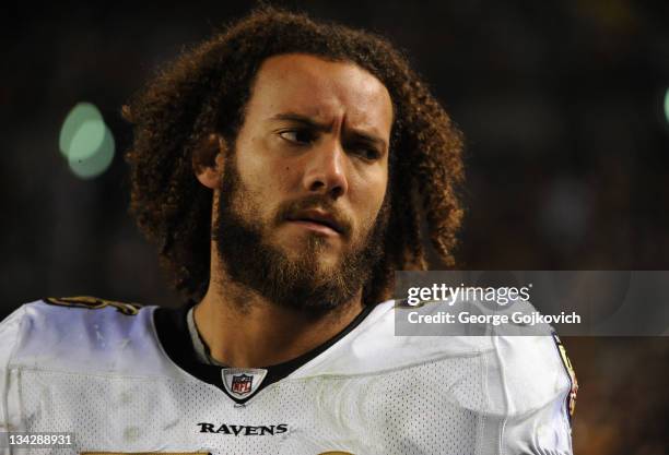 Offensive lineman Jah Reid of the Baltimore Ravens looks on from the sideline during a game against the Pittsburgh Steelers at Heinz Field on...