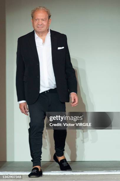 Fashion designer Ermanno Scervino walks the runway during the Ermano Scervino Ready to Wear Spring/Summer 2022 fashion show as part of the Milan...