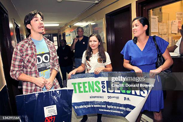 Justin Long, Alexandra Capellini and Naomi Hirabayashi pose with Alexandras Teens for Jeans project banner during the 'DoSomething.org Re-launches As...