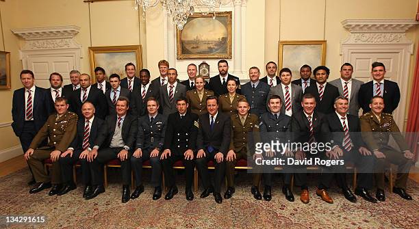 The Northern Hemisphere team pose for a team photograph with the Prime Minster David Cameron during a reception for the Help For Heroes Challenge...