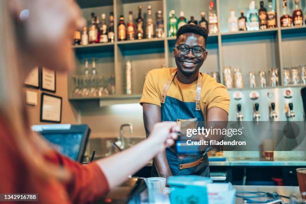 contactless payment - buying alcohol stock pictures, royalty-free photos & images