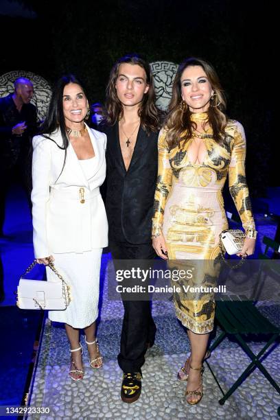 Demi Moore, Damian Charles Hurley and Elizabeth Hurley are seen on the front row of the Versace special event during the Milan Fashion Week - Spring...