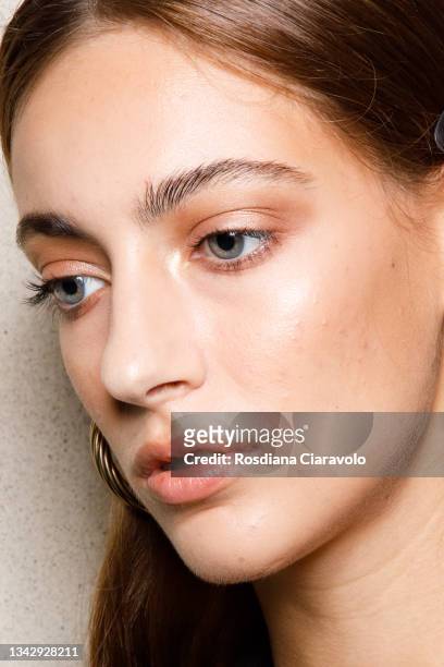 Model, make up detail, poses in the backstage of the Luisa Spagnoli fashion show during the Milan Fashion Week - Spring / Summer 2022 on September...