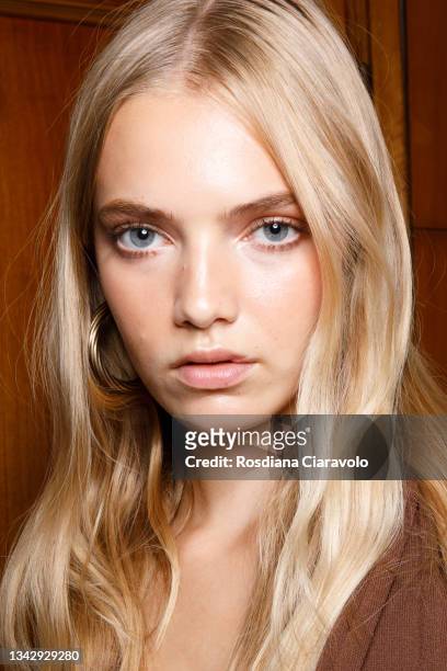 Model poses in the backstage of the Luisa Spagnoli fashion show during the Milan Fashion Week - Spring / Summer 2022 on September 26, 2021 in Milan,...