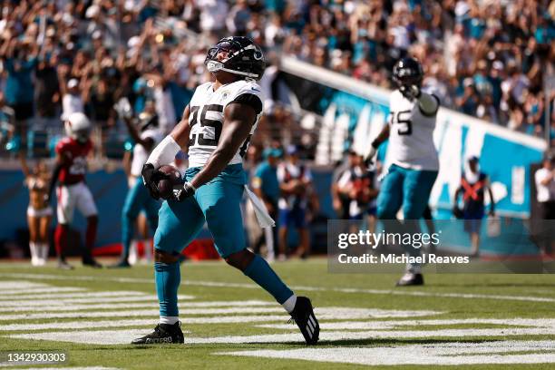 James Robinson of the Jacksonville Jaguars celebrates after scoring a touchdown during the third quarter in the game against the Arizona Cardinals at...