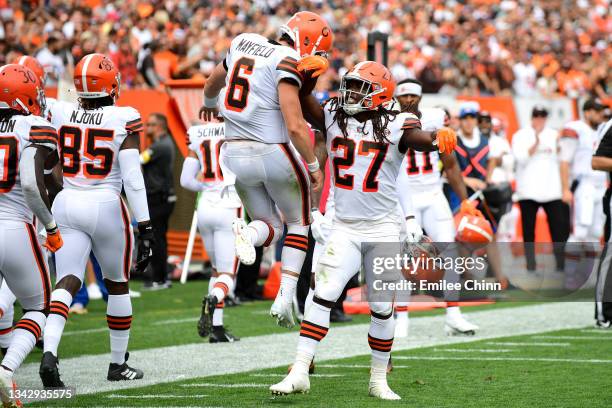 Kareem Hunt of the Cleveland Browns celebrates with Baker Mayfield after running the ball for a touchdown during the fourth quarter in the game...