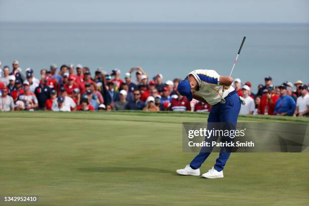 Jon Rahm of Spain and team Europe reacts on the 15th green as he loses to Scottie Scheffler of team United States 4&3 during Sunday Singles Matches...