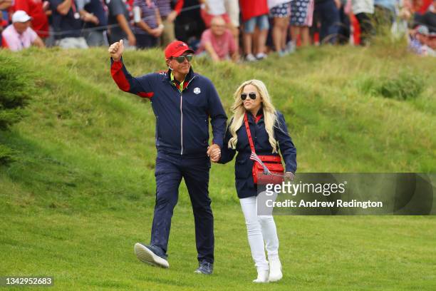 Vice-captain Phil Mickelson of team United States and wife Amy Mickelson look on during Sunday Singles Matches of the 43rd Ryder Cup at Whistling...