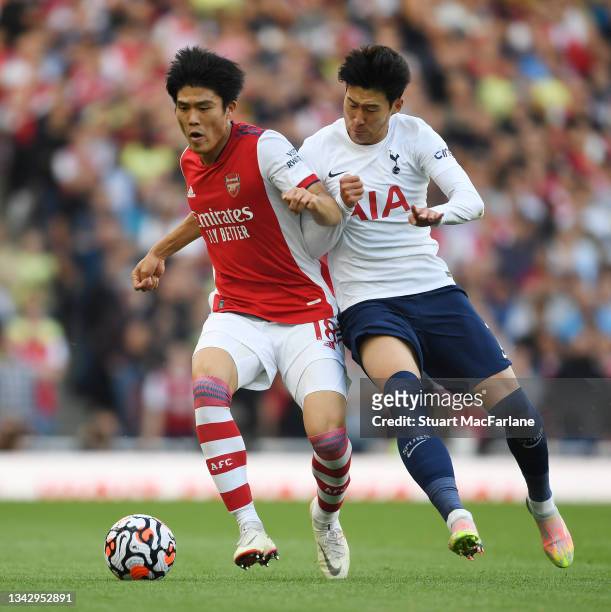 Takehiro Tomiyasu of Arsenal takes on Son Heung-Mi of Tottenham during the Premier League match between Arsenal and Tottenham Hotspur at Emirates...