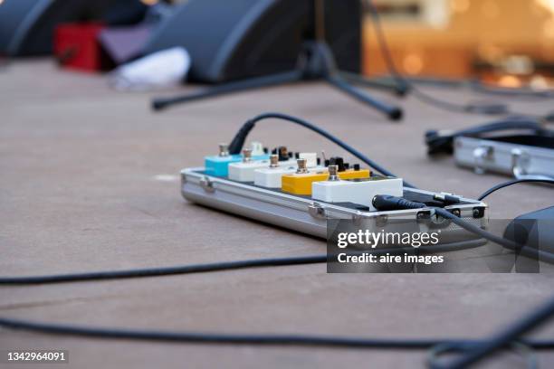 close up of musical pedal analog equipment flooring on stage rock concert - scene di videogiochi foto e immagini stock