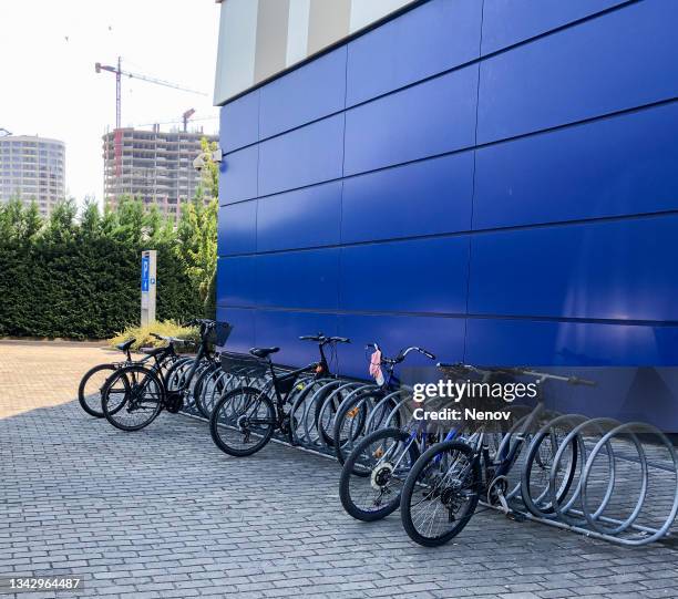 image of bicycle parking - bicycle parking station stock pictures, royalty-free photos & images