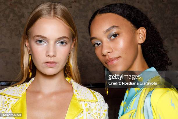 Models pose in the backstage of the Hui fashion show during the Milan Fashion Week - Spring / Summer 2022 on September 26, 2021 in Milan, Italy.