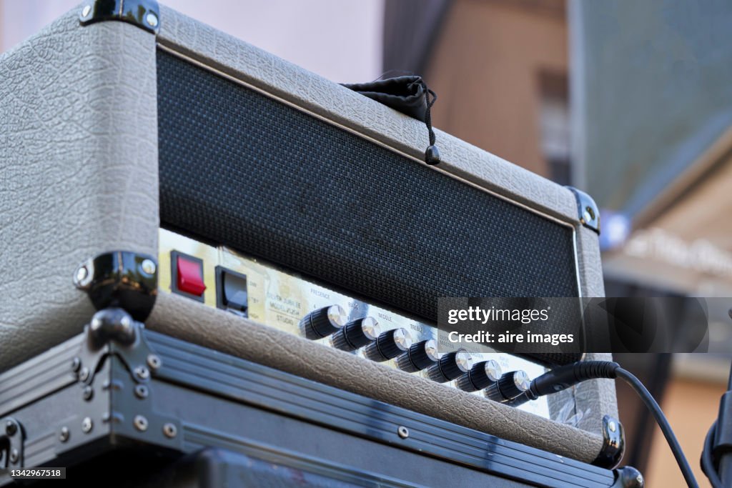 Bass Guitar amplifier backstage detail of sound volume controls in vintage style