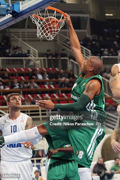 Mike Batiste, #8 of Panathinaikos Athens slam dunks during the 2011-2012 Turkish Airlines Euroleague Regular Season Game Day 7 between Panathinaikos...