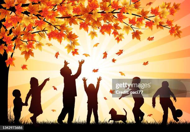 happy children playing in the leaves - branch plant part stock illustrations