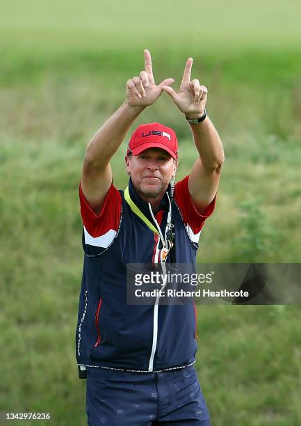 Captain Steve Stricker of team United States gestures a W sign after Team United States won during Sunday Singles Matches of the 43rd Ryder Cup at...