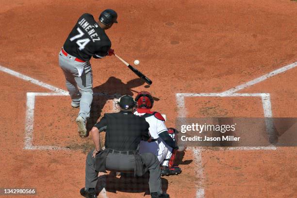 Eloy Jimenez of the Chicago White Sox hits a two RBI single during the third inning against the Cleveland Indians at Progressive Field on September...