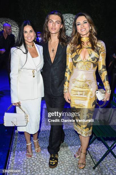 Demi Moore, Damian Charles Hurley and Elizabeth Hurley are seen on the front row of the Versace special event during the Milan Fashion Week - Spring...