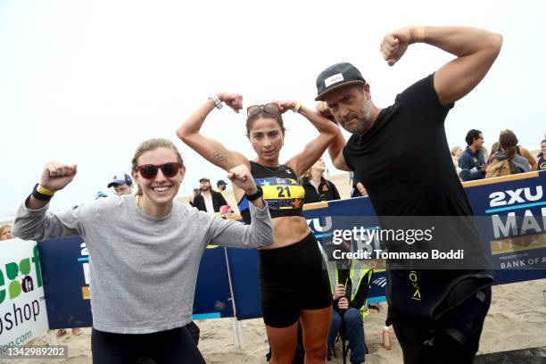 Mary Cain, Alexi Pappas and Rich Roll compete in the celebrity race at the 34th Annual Malibu Triathlon at Zuma Beach on September 26, 2021 in...