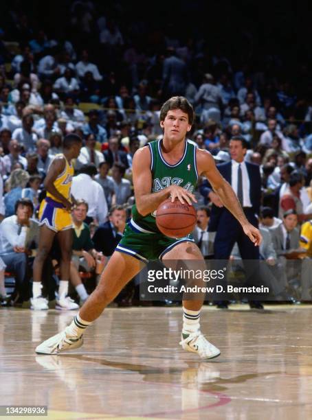 Steve Alford of the Dallas Mavericks dribbles against the Los Angeles Lakers circa 1987 at the Great Western Forum in Inglewood, California . NOTE TO...