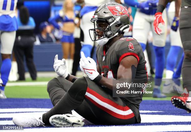 Chris Godwin of the Tampa Bay Buccaneers poses in the endzone after scoring a touchdown during the second quarter in the game against the Los Angeles...