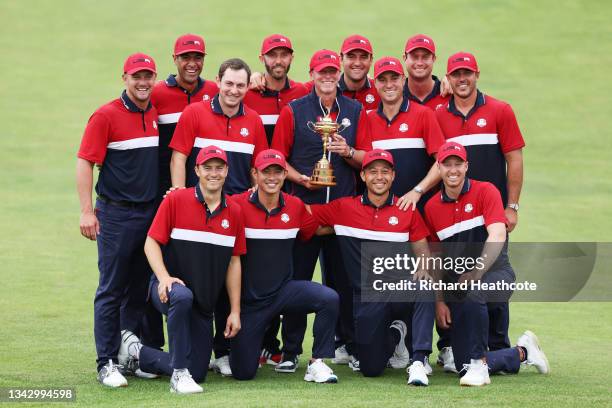 Team United States celebrates with the Ryder Cup after defeating Team Europe 19 to 9 during the 43rd Ryder Cup at Whistling Straits on September 26,...