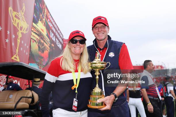 Captain Steve Stricker of team United States and wife Nicki Stricker celebrate with the Ryder Cup after defeating Team Europe 19 to 9 during the 43rd...