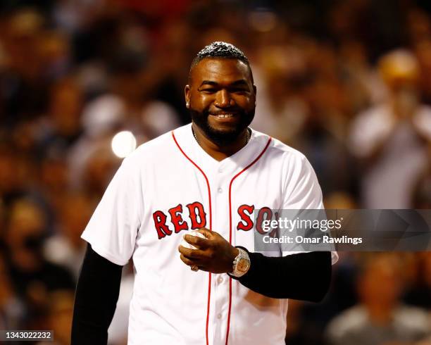 Former Boston Red Sox great David Ortiz reacts before the game between the Red Sox and the New York Yankees at Fenway Park on September 26, 2021 in...