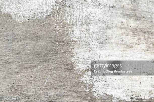 gray textured wall with white paint smear. decorative loft plaster - alabaster background stock pictures, royalty-free photos & images