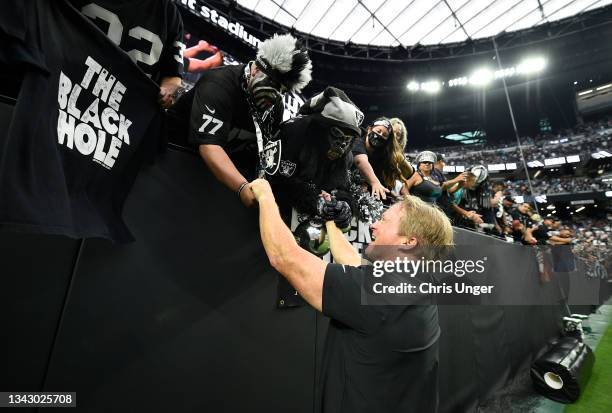 Head coach Jon Gruden of the Las Vegas Raiders interacts with fans after the Las Vegas Raiders defeated the Miami Dolphins 31-28 at Allegiant Stadium...