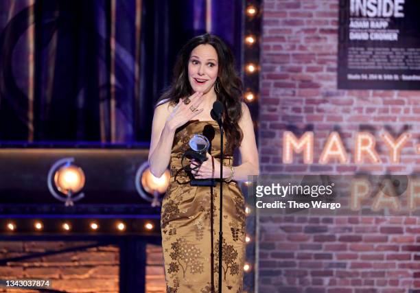 Mary-Louise Parker accepts the award for Best Performance by an Actress in a Leading Role in a Play for "The Sound Inside" onstage during the 74th...