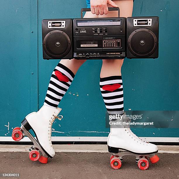 legs of woman wearing white roller skates - roller skate stock pictures, royalty-free photos & images