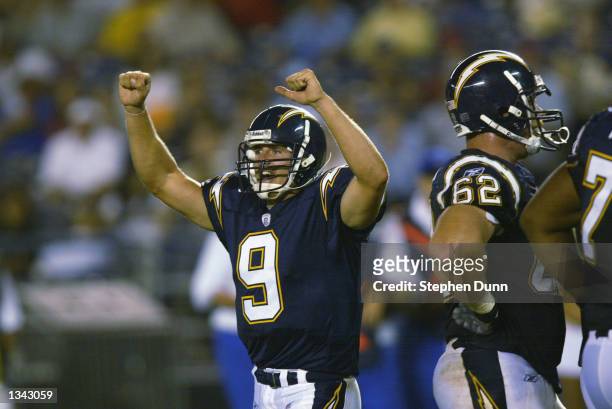Quarterback Drew Brees of the San Diego Chargers celebrates against the Arizona Cardinals in their preseason game on August 10, 2002 at Qualcomm...